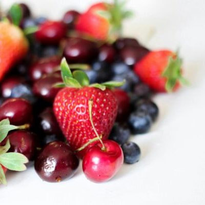 Close-Up Photography of Strawberries And Cherries