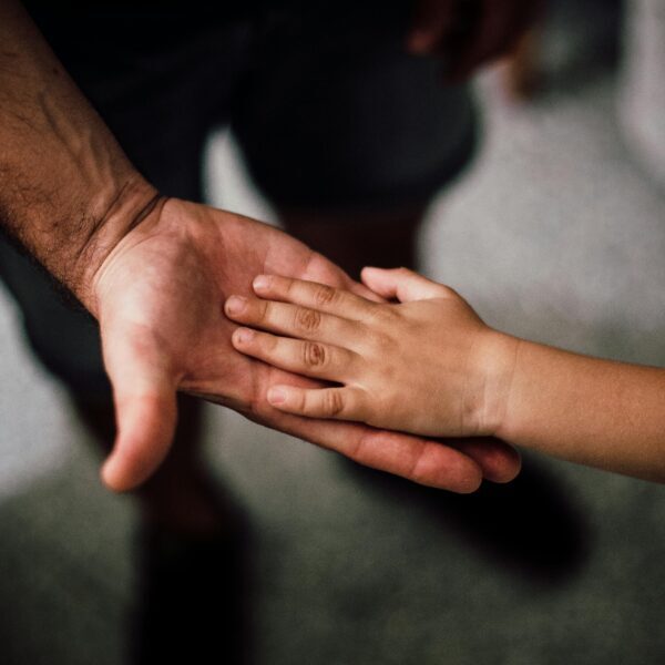 Father and Child's Hands Together