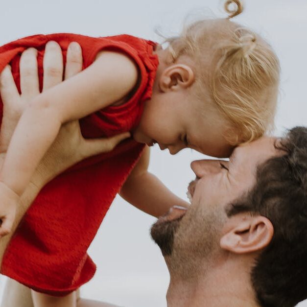 Father Holding His Daughter