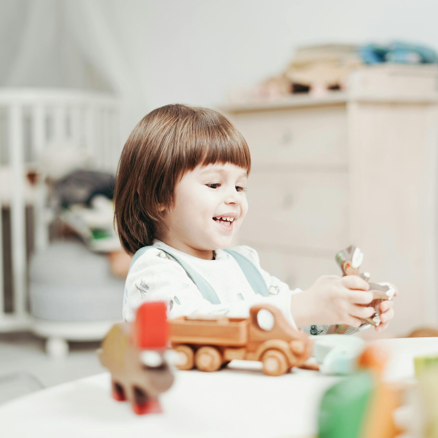 Child Playing With Lego Blocks