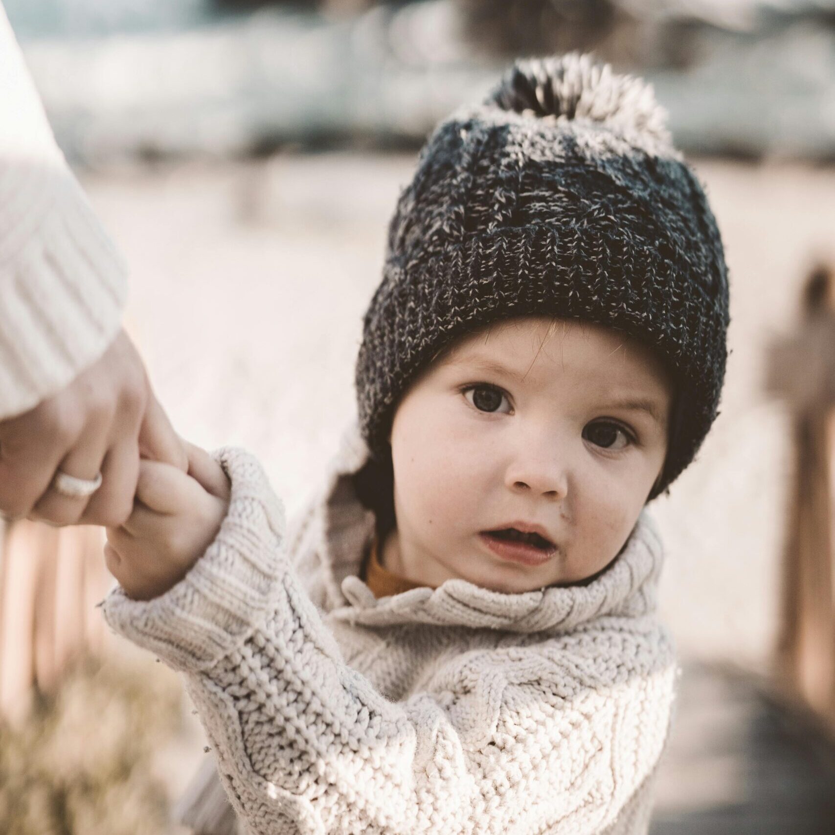 Photo Of Toddler Wearing Knitted Sweater